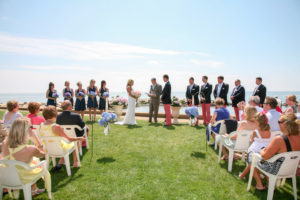 A Cape Cod wedding ceremony featuring local vendors like a wedding photographer.