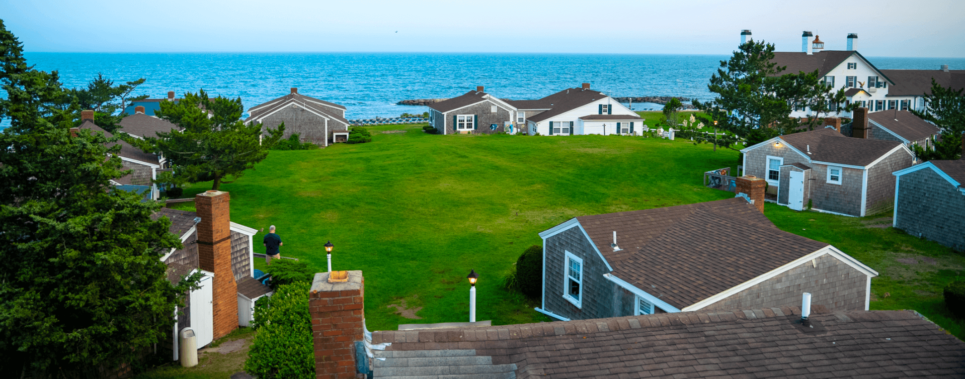 A collection of cottages at a Cape Cod resort perfect for glamping.