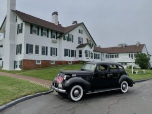 The front of a Cape Cod resort close to local shops.