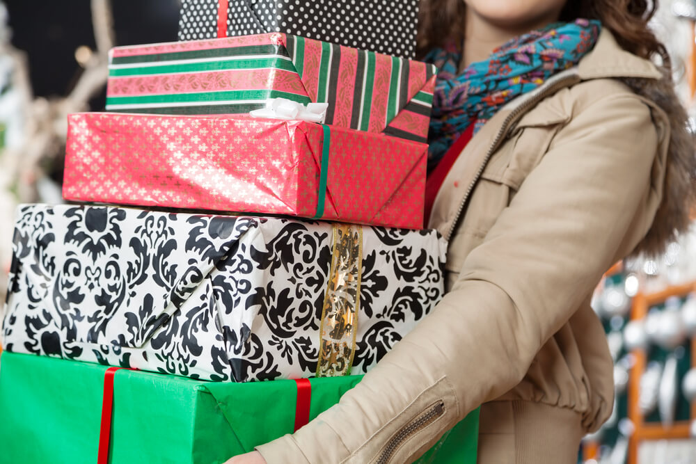 A person with gifts purchased at Cape Cod shops.