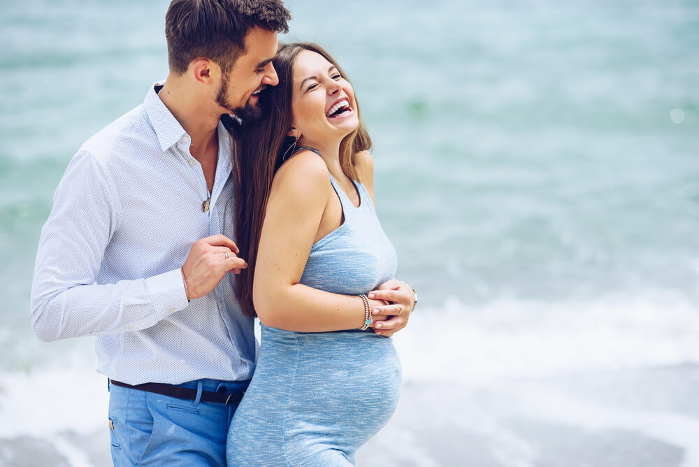 A couple on their Cape Cod babymoon.