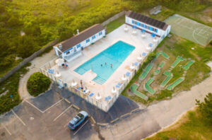 The pool at a West Dennis resort to relax in after exploring towns on Cape Cod with a European feel.