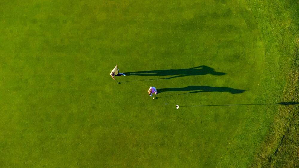 People on a golf course on Cape Cod.