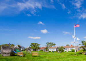 A view of cottages and an area to play at one of the best places to stay on Cape Cod.